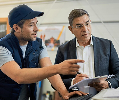 Two people discussing